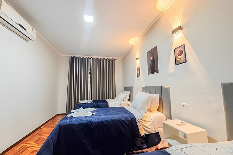 Casa espaçosa, 3 quartos com ar + 2 vagas