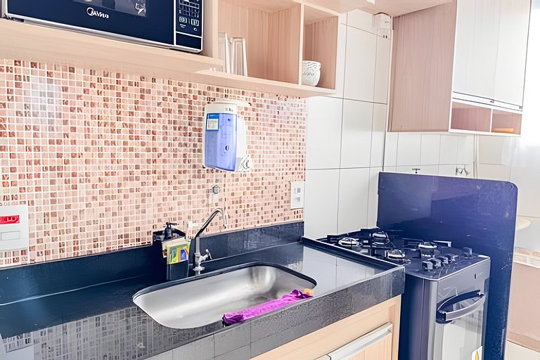 Apê elegante com ar-cond, vaga e ótima localização