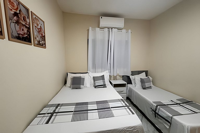 Casa há 4 minutos do centro + ar cond. e vaga