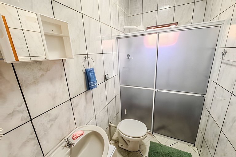 Casa há 4 minutos do centro + ar cond. e vaga