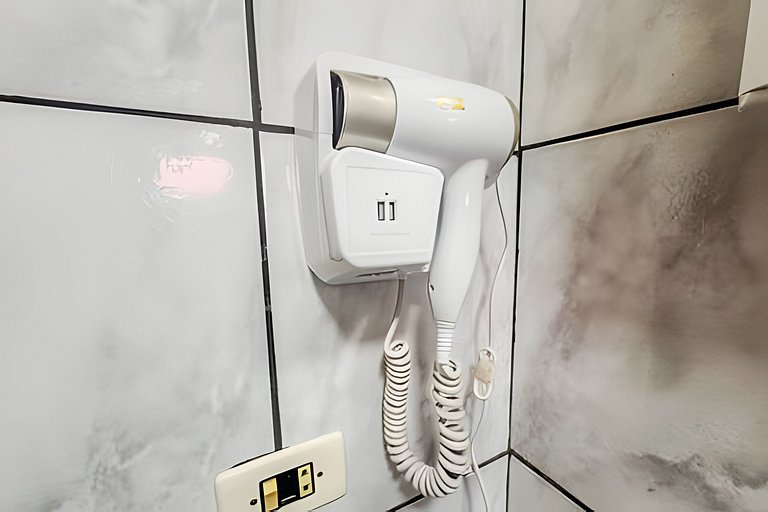 Casa há 4 minutos do centro + ar cond. e vaga