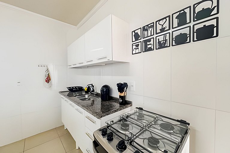 Flat em charmoso residencial + ar cond. e vaga