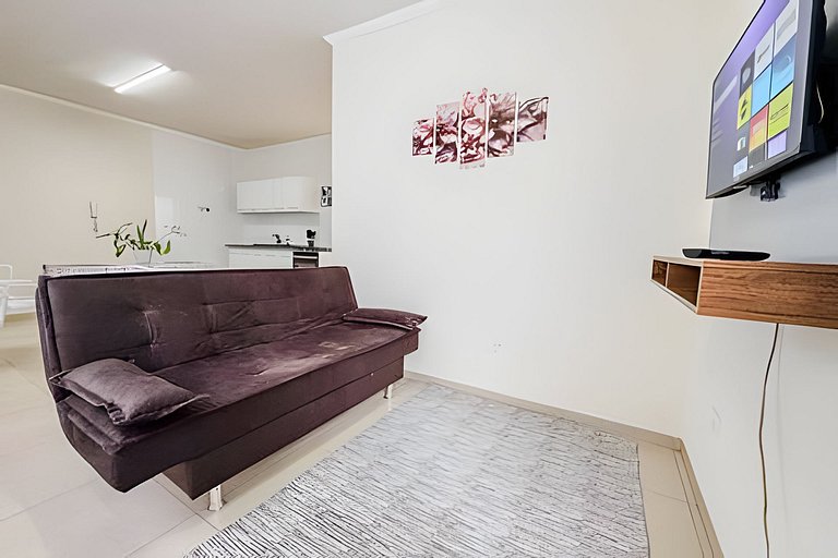 Flat em charmoso residencial + ar cond. e vaga