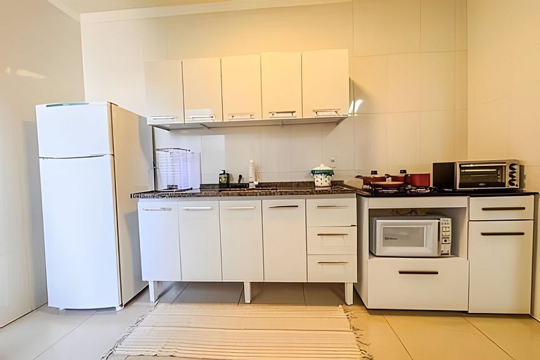 Flat completo em residencial + ar cond. e vaga