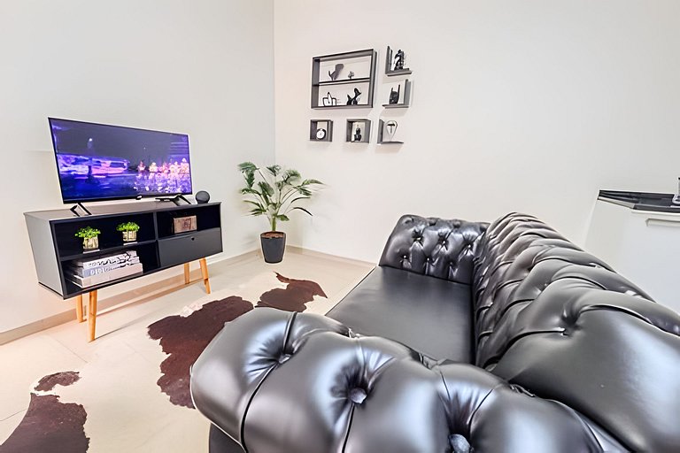 Flat completo em residencial + ar cond. e vaga