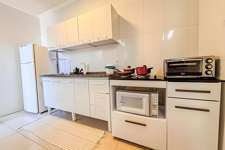 Flat completo em residencial + ar cond. e vaga