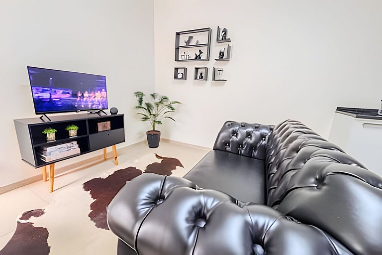 Flat completo em residencial + ar cond. e vaga