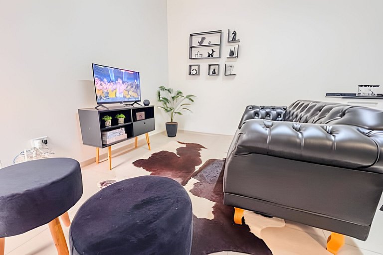 Flat completo em residencial + ar cond. e vaga